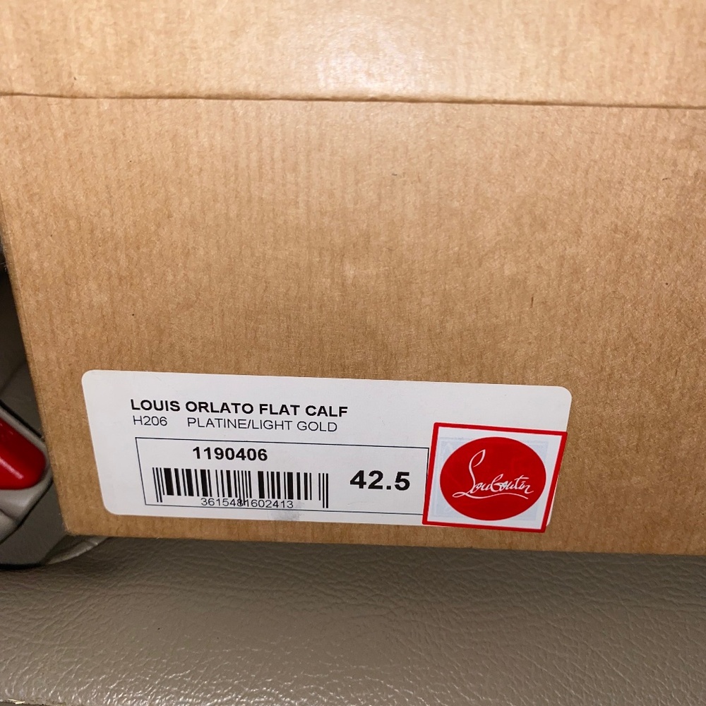 Christian Louboutin platinum and gold sneakers